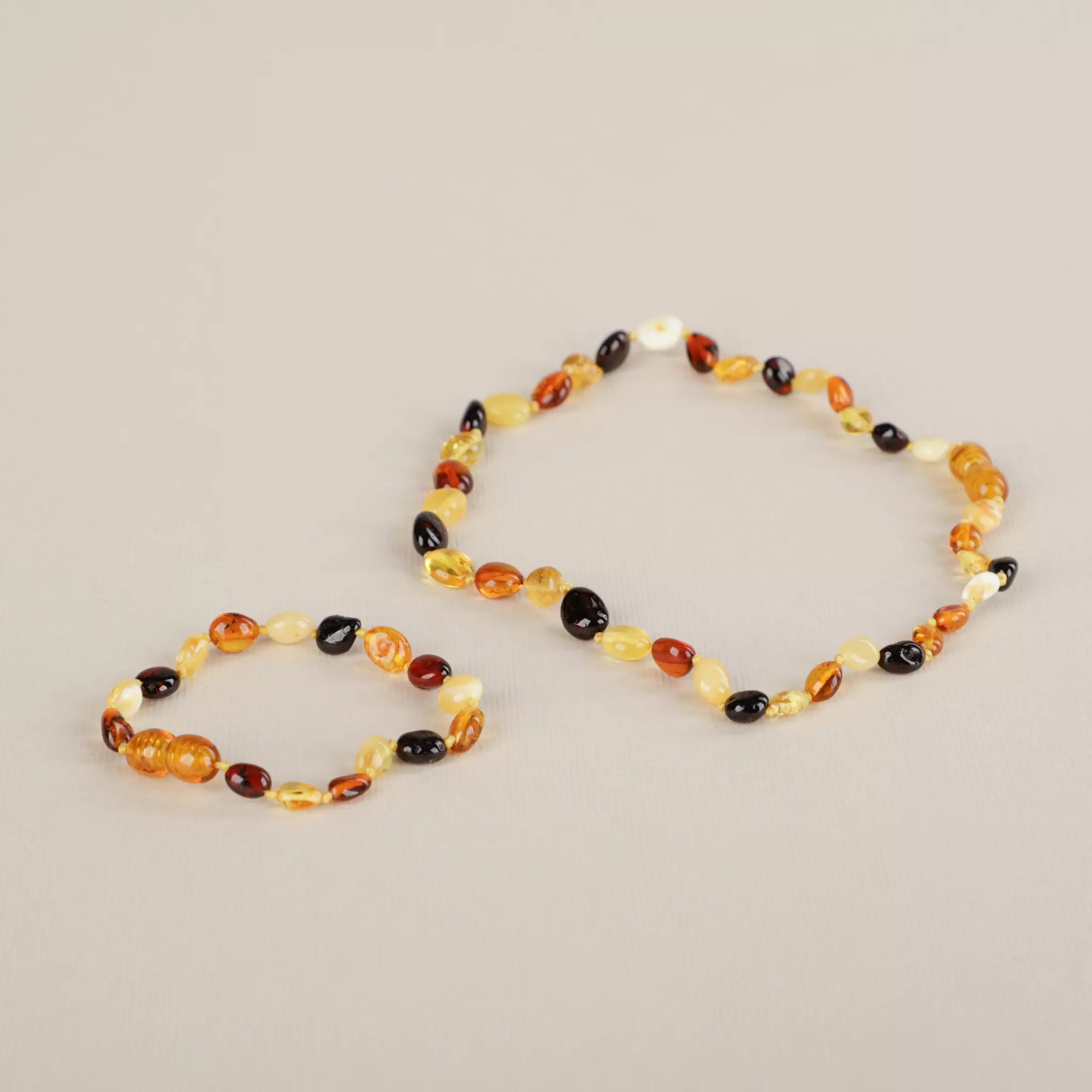Amber for Africa - Baltic Amber Teething Necklace Heart Pendant - Kids  Emporium